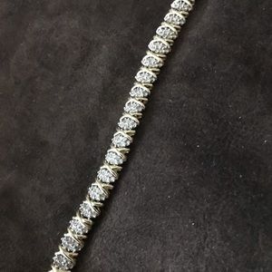 Gold and diamond bracelet. 6” $350